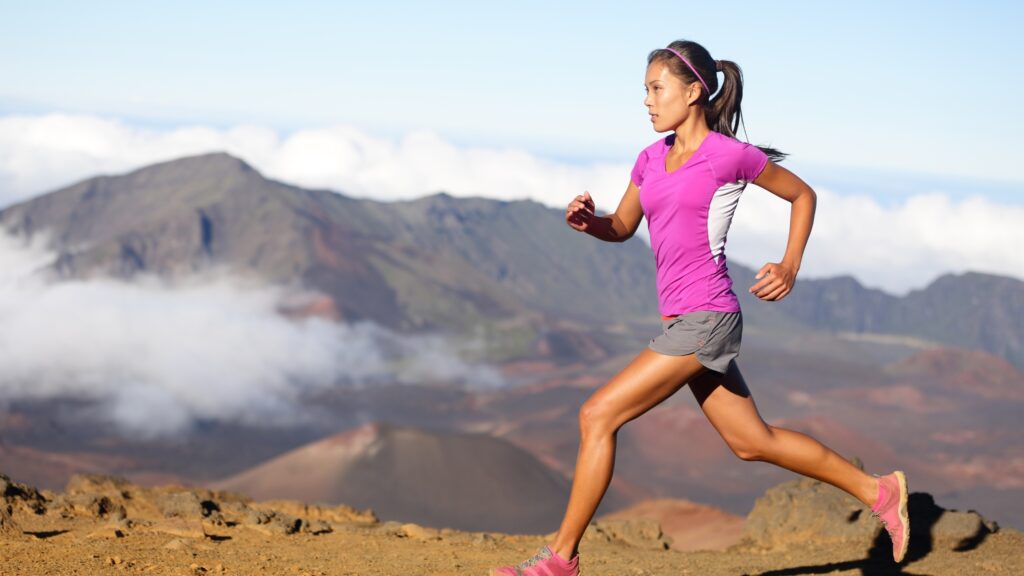 A picture of a women running to show why it's important to have a diet for ultra marathoners when training.