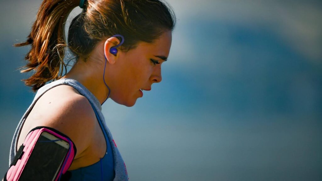 Endurance athlete looking fatigued after a run, representing the confusion and frustration caused by misleading sports nutrition marketing claims.